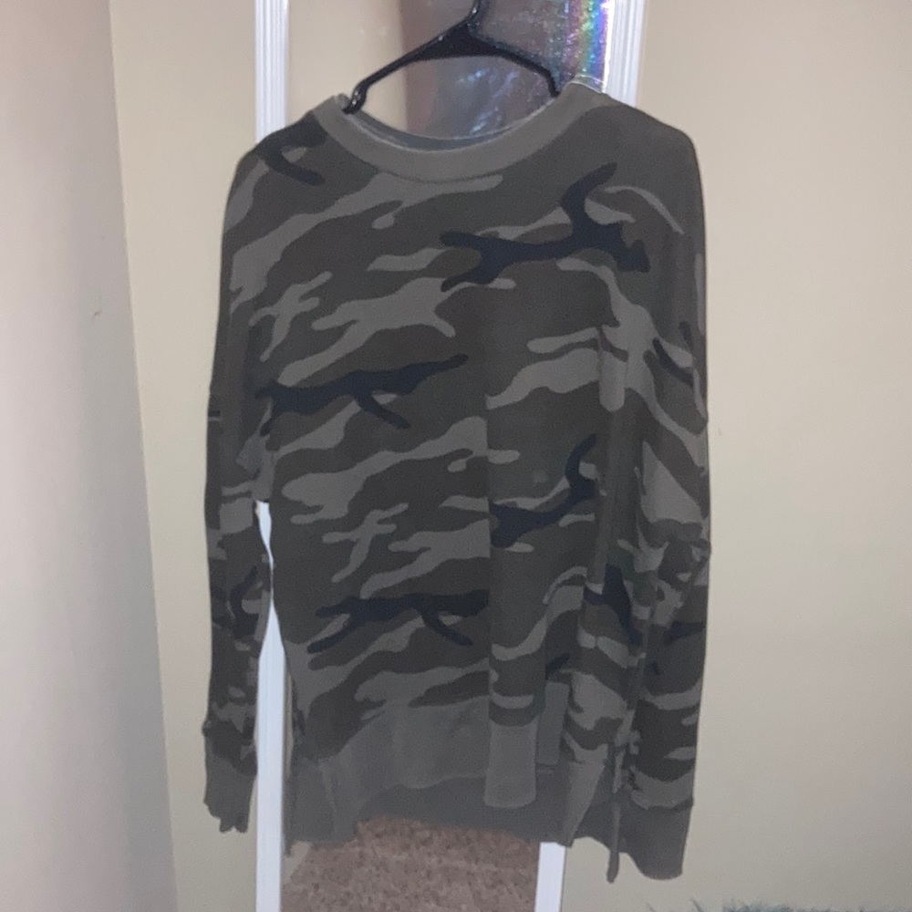 Sweater Size XL fits more like a L